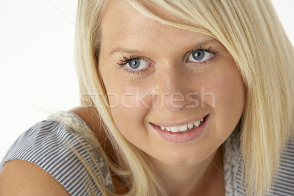 Young Blonde Woman Smiling Stock Photo C Monkey Business Images