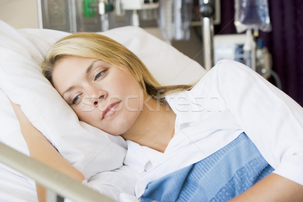 Woman Lying Down In Hospital Bed Stock photo © monkey_business