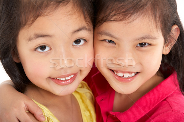 Studio Shot Of Two Chinese Girls Stock photo © monkey_business