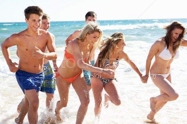 Group Of Teenage Friends Enjoying Beach Holiday Together Stock photo © monkey_business