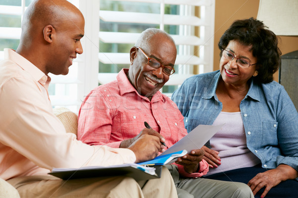 Financial Advisor Talking To Senior Couple At Home Stock photo © monkey_business