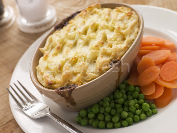 Individual Cottage Pie with Peas and Carrots Stock photo © monkey_business