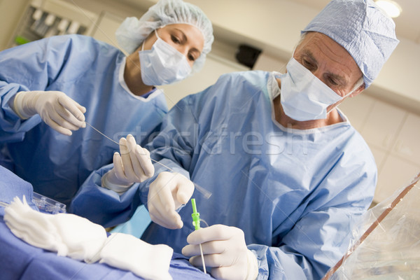 Chirurgen Ausrüstung Chirurgie Frau Mann Gesundheit Stock foto © monkey_business