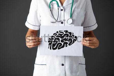 American nurse holding ink drawing lungs Stock photo © monkey_business