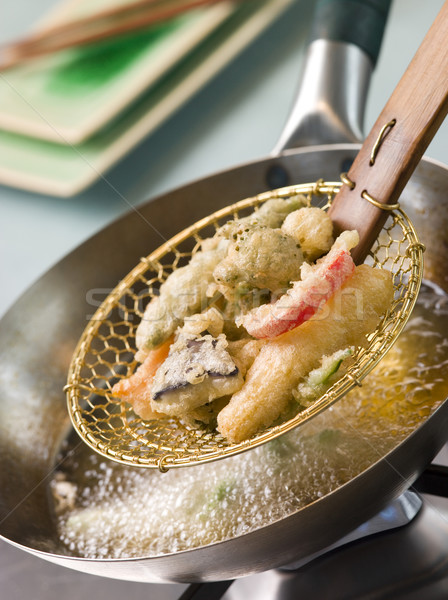 Stock photo: Cooking Tempura Of Vegetables in a Wok