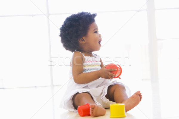 Baba bent játszik csésze játékok gyerekek Stock fotó © monkey_business