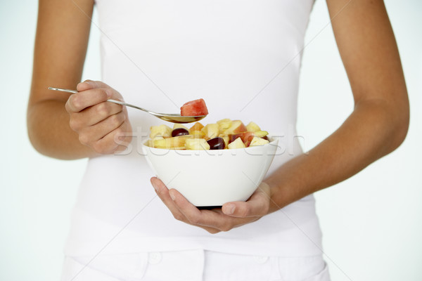Stockfoto: Jonge · vrouw · eten · vers · fruit · salade · home · persoon