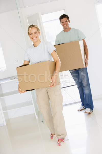 Cuplu Dulapuri în mişcare casa noua zâmbitor femeie Imagine de stoc © monkey_business