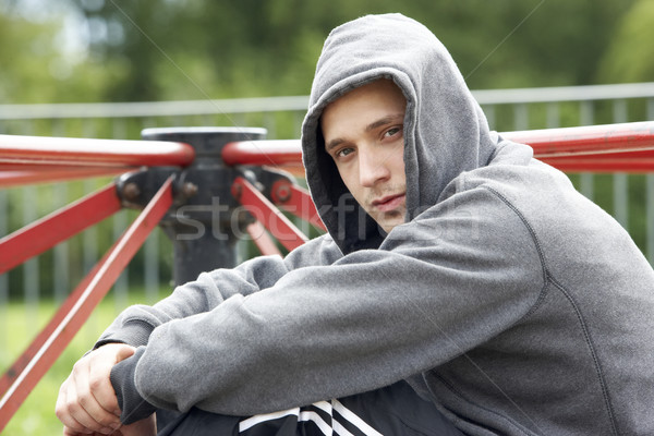молодым человеком сидят площадка человека улице печально Сток-фото © monkey_business