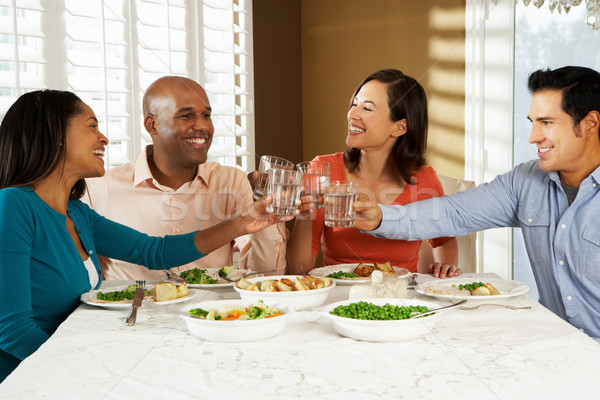 Grupo amigos comida casa agua Foto stock © monkey_business