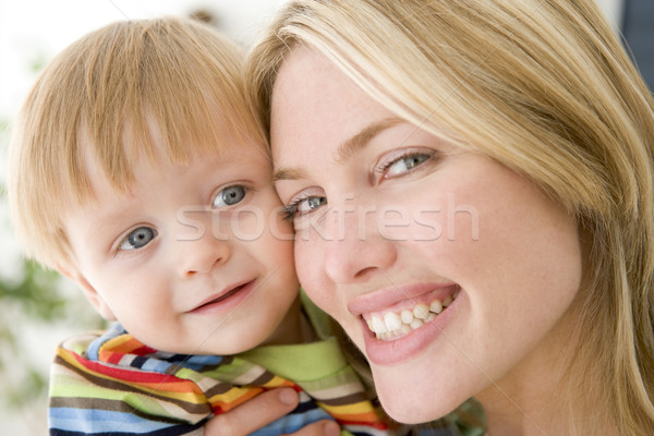 Mother and young boy indoors smiling Stock photo © monkey_business