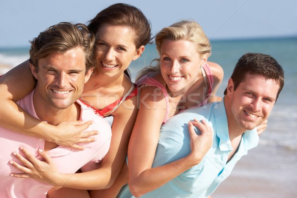 Group Of Friends Enjoying Beach Holiday Stock photo © monkey_business