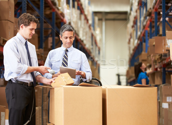 Stockfoto: Zakenlieden · dozen · digitale · tablet · scanner · business