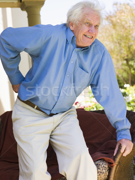 Homem dor nas costas de volta dor camisas doente Foto stock © monkey_business