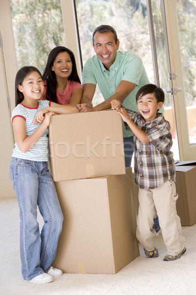 Család dobozok új otthon mosolyog nő ház Stock fotó © monkey_business