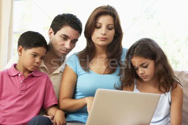 Stock photo: Grandparents With Grandchildren Relaxing At Home Together