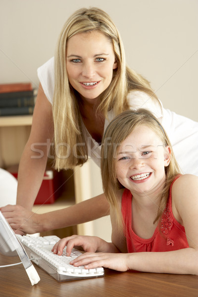 Mother And Daughter At Home Using Computer Stock photo © monkey_business