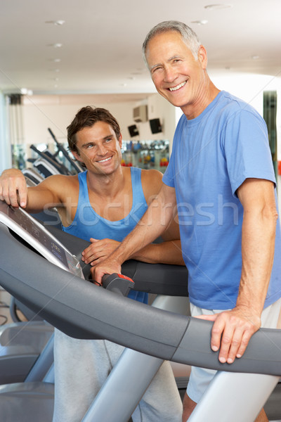 Stockfoto: Man · werken · personal · trainer · lopen · machine · gymnasium