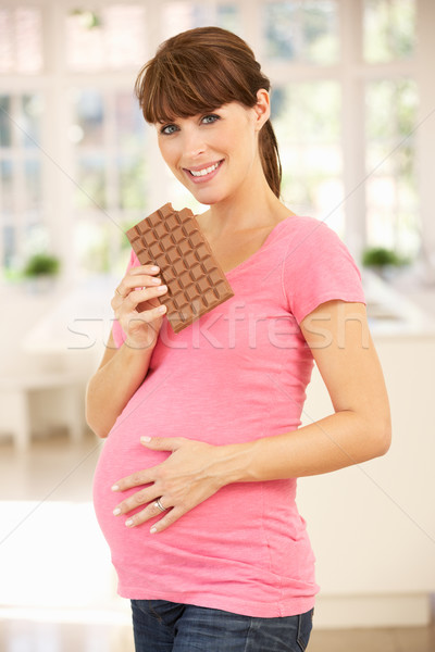 Stok fotoğraf: Hamile · kadın · yeme · çikolata · kadın · gıda · bebek