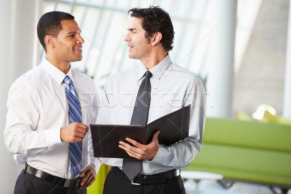 Kettő üzletemberek kötetlen megbeszélés modern iroda Stock fotó © monkey_business