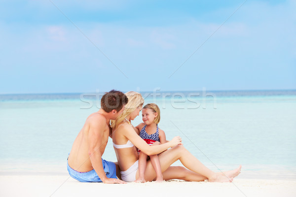 Stock photo: Family Relaxing On Beautiful Beach Together