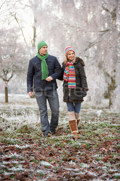 Couple On Winter Walk Through Frosty Landscape Stock photo © monkey_business