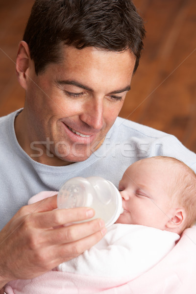 Portrait Of Father Feeding Newborn Baby At Home Stock photo © monkey_business