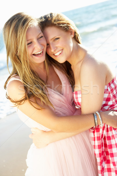 Dois férias na praia juntos praia Foto stock © monkey_business