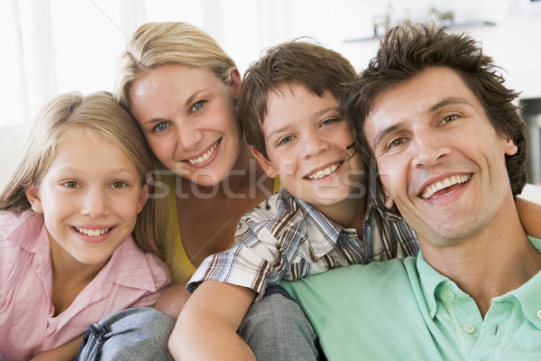 Stock foto: Familie · Wohnzimmer · lächelnd · Mädchen · Mann · glücklich
