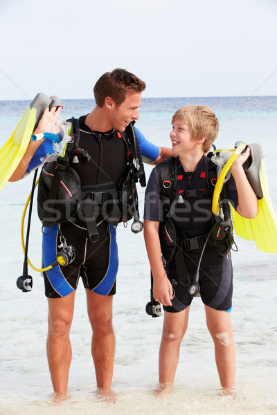 Stock photo: Father And Son With Scuba Diving Equipment On Beach Holiday