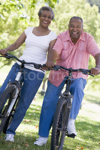 Devir kadın adam egzersiz bisiklet Stok fotoğraf © monkey_business