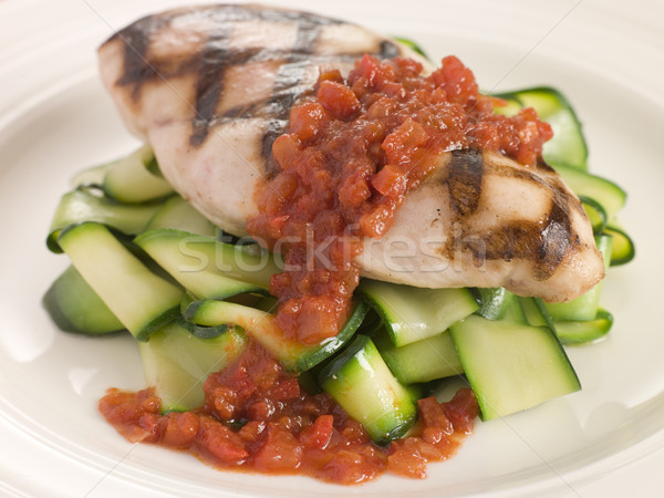 Stock photo: Chargrilled Chicken Breast with Courgette Ribbons and Tomato Con
