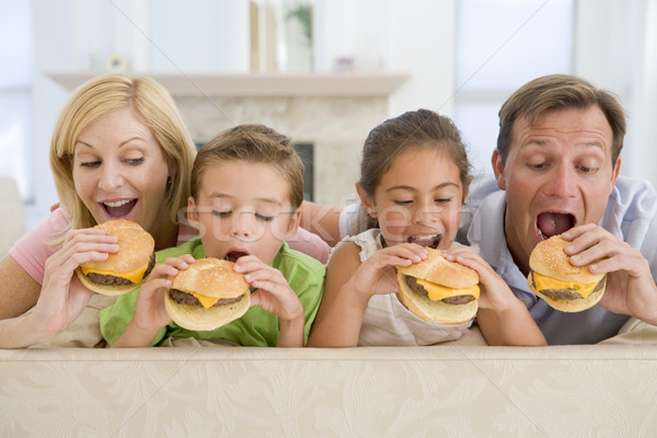 Family Eating Cheeseburgers Together Stock photo © monkey_business