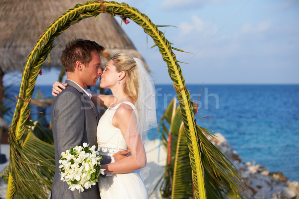 Bride And Groom Getting Married In Beach Ceremony Stock photo © monkey_business