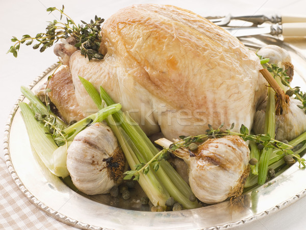 40 Clove of Garlic Roasted Chicken with Baby Spring Vegetables Stock photo © monkey_business