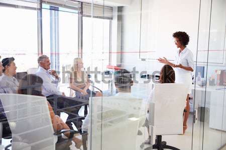 Stock photo: Passengers waiting in airport departure lounge