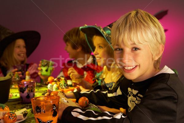 Halloween party with children having fun in fancy costumes Stock photo © monkey_business