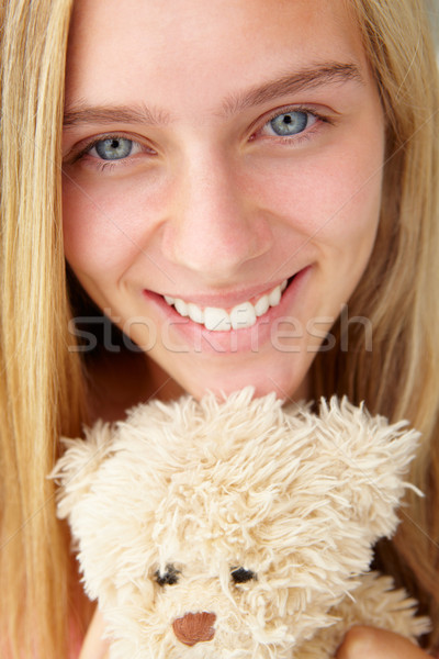 Close up teenage girl with cuddly toy Stock photo © monkey_business