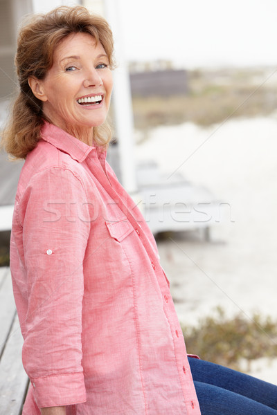 Senior Frau Sitzung Freien Strand glücklich Stock foto © monkey_business