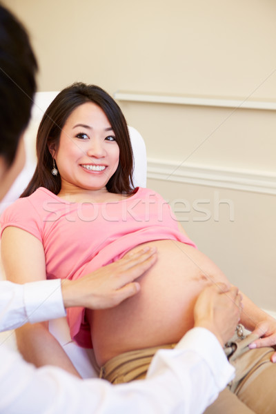 Pregnant Woman Being Given Ante Natal Check By Doctor Stock photo © monkey_business