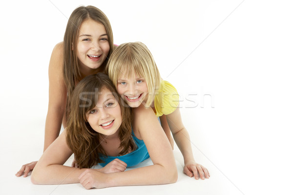 Csoport három fiatal lányok stúdió lány Stock fotó © monkey_business