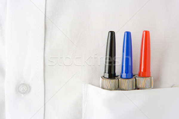 Close Up Of 3 Pens Neatly Sitting In A Mans White Shirt Pocket Stock photo © monkey_business