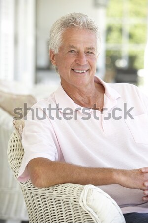 Stock photo: Senior Man Sitting In Hospital Bed