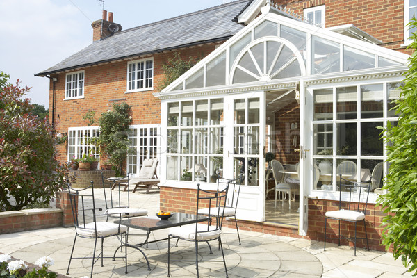 Exterior Of House With Conservatory And Patio Stock photo © monkey_business