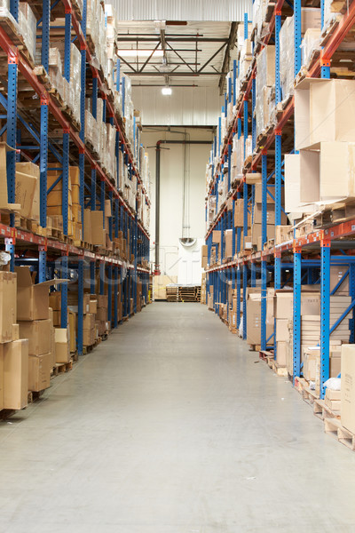 Interior Of Warehouse With Goods On Shelves Stock photo © monkey_business