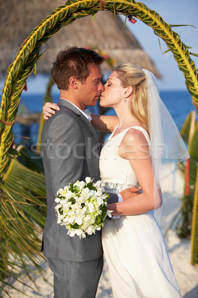 Bride And Groom Getting Married In Beach Ceremony Stock photo © monkey_business