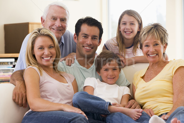 Stock photo: Extended family in living room smiling