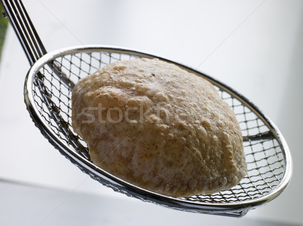 Deep Fried Puff Bread on a Strainer Stock photo © monkey_business