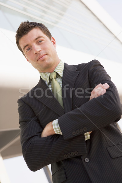 Businessman standing outdoors by building Stock photo © monkey_business