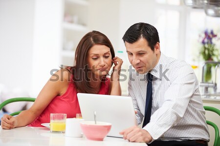 Stock photo: A young couple arguing at the breakfast table